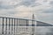 Road passage over water on cloudy sky. Bridge over sea in manaus, brazil. architecture and design concept. Travel destination and