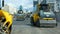 Road Paving. Workers laying stone mastic asphalt during street repairing works.