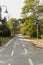 Road for pedestrians and bicycles, bike lane in the park, signposted