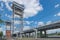 Road and railway two-level liftbridge on the Pregolya river on a sunny summer day. Created in 1914-1926. Until 1945, the bridge