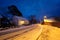 Road in Ramberg village with red traditional rorbue houses in the night, Norway