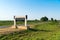 Road in the regions of Azerbaijan, city name on signboard - Salyan rayonu