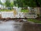 The road repair fence fell from the wind