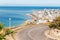 road and Rhodes resort town and azure sea bay