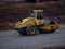 Road roller close up. Roller rolling asphalt on the new road.