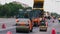 Road rollers working on a city street. Heavy industrial machinery on the construction of new road.