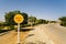 Road round yellow sign with the inscription: The maximum speed i