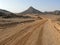 The road running through the Sahara desert.