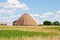 Road Salt Storage Building in Field