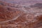 The road between San Pedro de Atacama and Calama. View of the landscape of the Atacama Desert. The rocks of the Mars Valley Valle