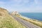 Road by the sea on Causeway coastal route in Northern Ireland