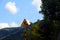 Road sign on a background of mountains and sky. Roadworks ahead