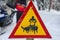 Road sign beware of sledge dog team