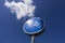 Road sign `Bike path` sunlit with white cloud