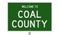 Road sign for Coal County