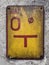 Road sign on concrete wall