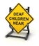 Road sign - deaf children near