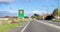 Road sign designating a fifty kilometre per hour speed zone travelling through the town of Bulls