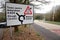 Road sign with directions to Amersham, Slough and Watford on London Road, Rickmansworth