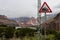 Road Sign Falling Warning on the Karakorum Highway