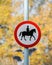 Road sign with horse