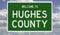 Road sign for Hughes County