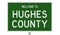 Road sign for Hughes County