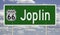 Road sign for Joplin Missouri on Route 66