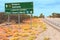 Road sign at Lasseter Highway to Ayers Rock, Australia