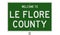 Road sign for Le Flore County