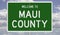 Road sign for Maui County