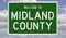 Road sign for Midland County