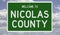 Road sign for Nicolas County