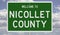 Road sign for Nicollet County