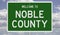 Road sign for Noble County