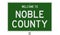 Road sign for Noble County