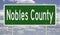 Road sign for Nobles County