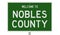 Road sign for Nobles County