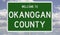 Road sign for Okanogan County