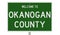 Road sign for Okanogan County