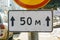 Road sign plate 50 meters close up