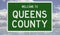 Road sign for Queens County