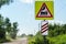 The road sign of the railway crossing. Attention motorists. Warning sign before the railway crossing