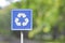 road sign with recycle logo symbol