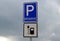 Road sign reservations for electric cars. Charging station with petrol stand symbol with cable and plug for electric battery charg