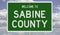 Road sign for Sabine County