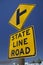 Road sign `State Line Road`