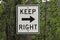 Road sign stating KEEP RIGHT
