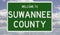 Road sign for Suwannee County