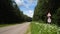 Road sign warning of dangerous right curve and sign Deer crossing.